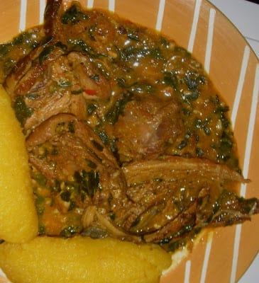 Vegetable Ogbono Soup With Beef And Fish Served With Garri Eba