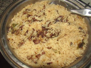 KILISHI (JERKY) COCONUT RICE SERVED WITH VEGETABLES